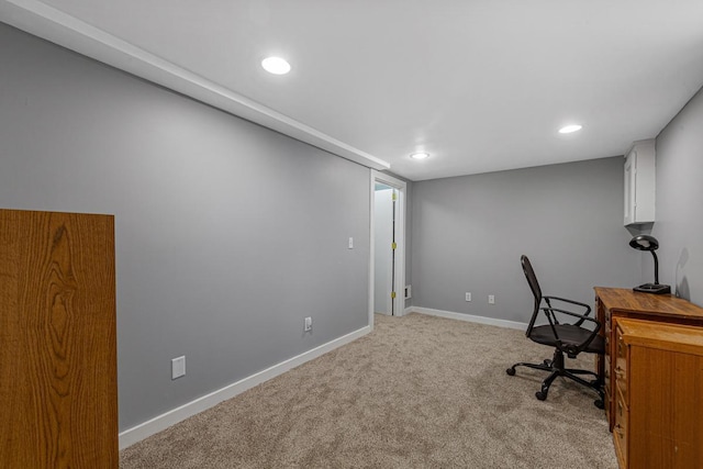 carpeted office space featuring recessed lighting and baseboards