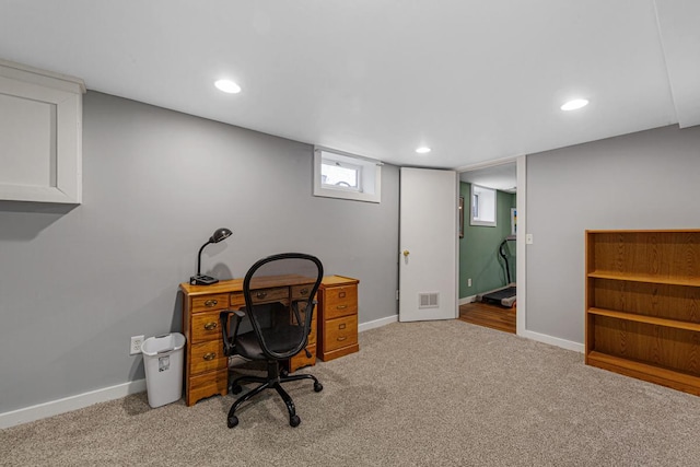 carpeted office space with recessed lighting, visible vents, and baseboards