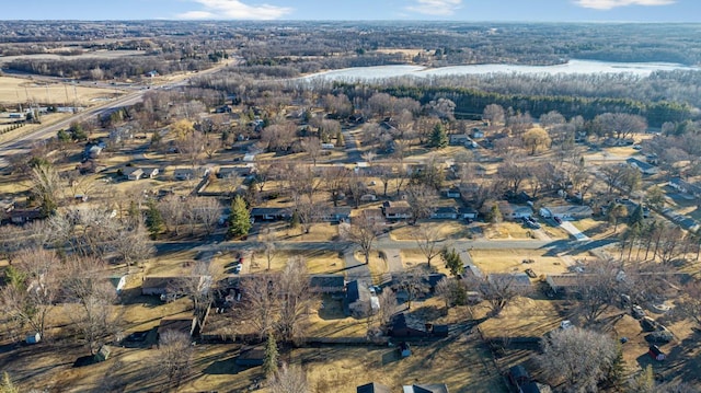 aerial view featuring a wooded view