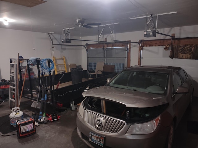 garage with ceiling fan and a garage door opener