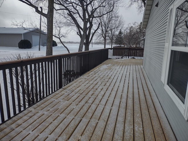 wooden deck featuring a water view