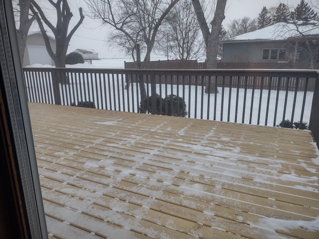 view of snow covered deck