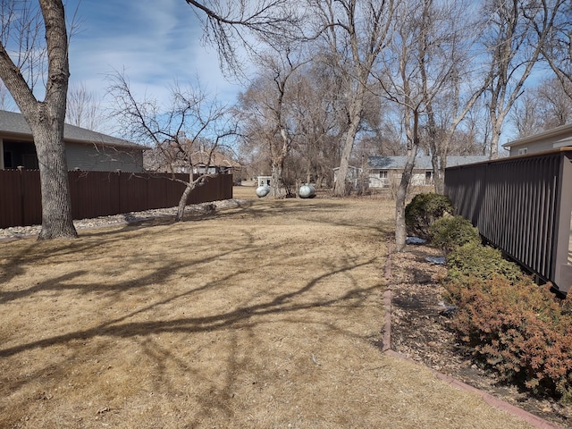 view of yard featuring fence