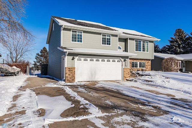 front of property with a garage