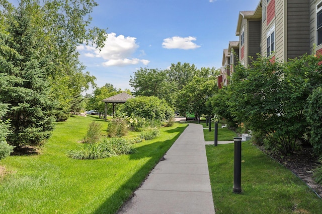 surrounding community featuring a gazebo and a yard