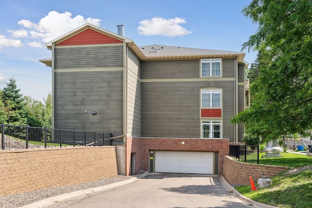 view of front of home featuring a garage