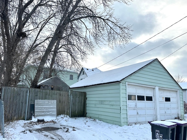 view of snow covered garage