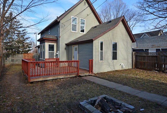 rear view of house with a deck