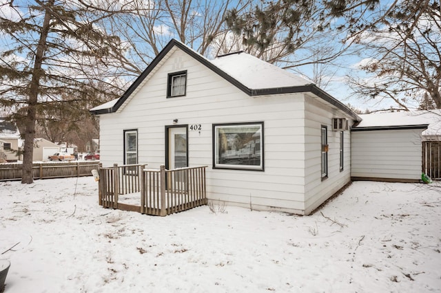 view of snow covered house