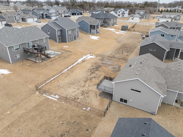 birds eye view of property with a residential view