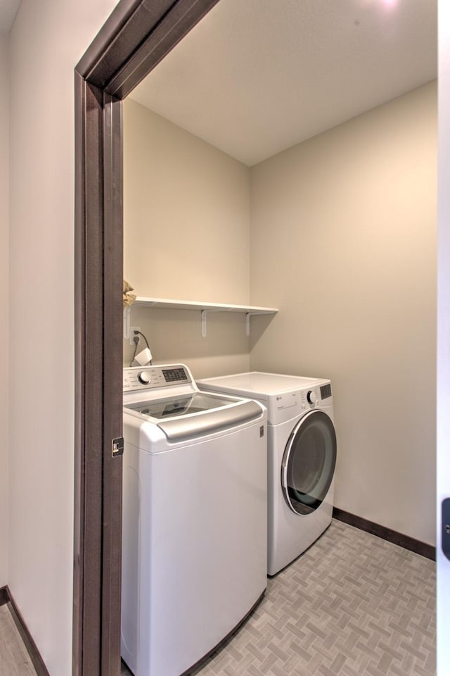 laundry area with washer and dryer