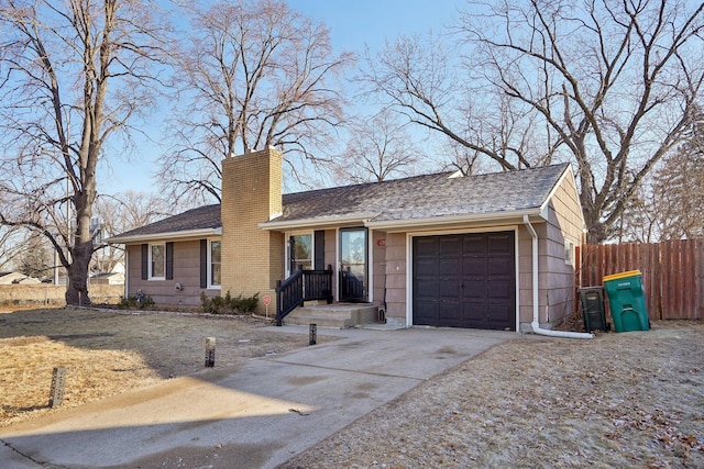 single story home with a garage