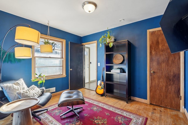 living area featuring wood-type flooring