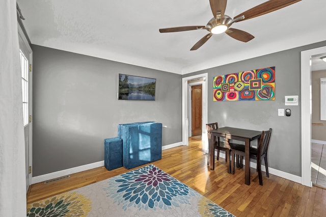 interior space featuring ceiling fan and hardwood / wood-style flooring