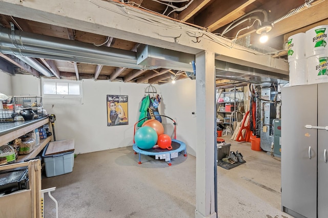 basement featuring heating unit