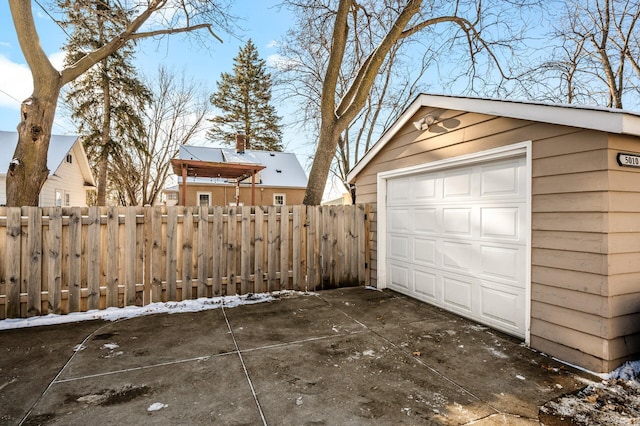 view of snow covered garage