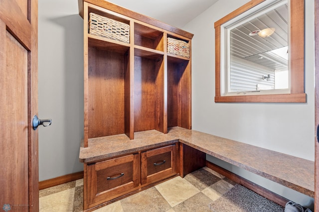 mudroom featuring built in desk