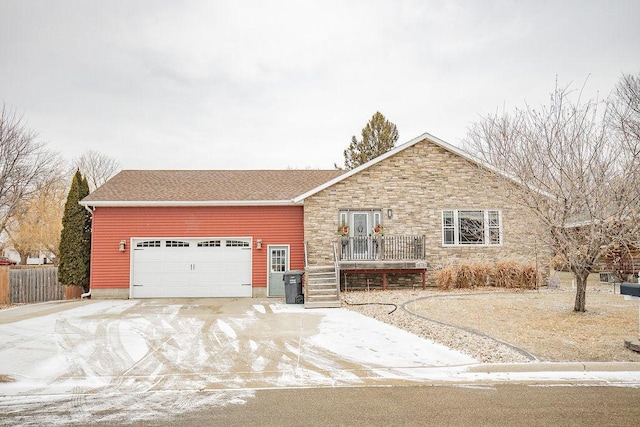 ranch-style house featuring a garage