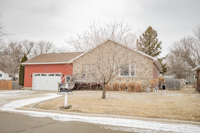 view of front of property featuring a garage