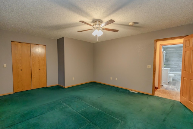 unfurnished bedroom featuring ceiling fan, a closet, carpet, and a textured ceiling