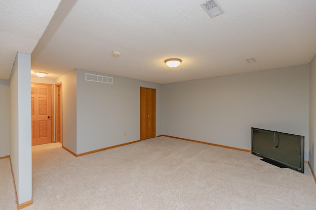 interior space featuring a textured ceiling