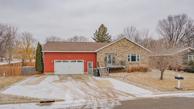 single story home featuring a garage