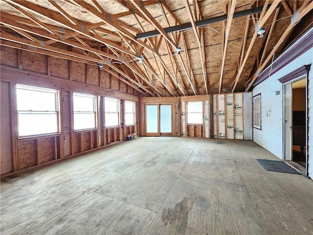 miscellaneous room featuring lofted ceiling