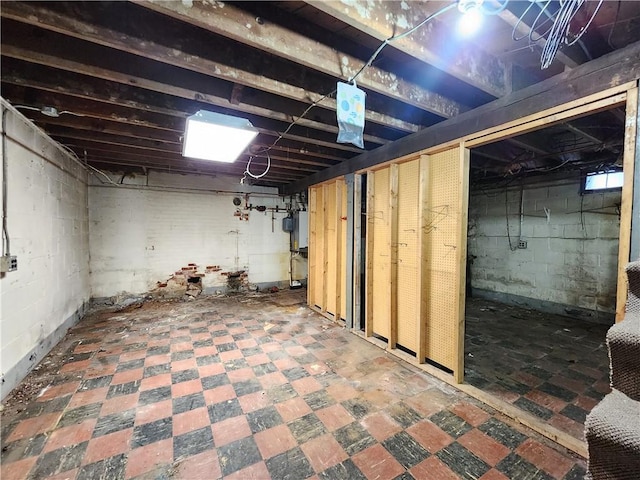 unfinished basement featuring tile patterned floors