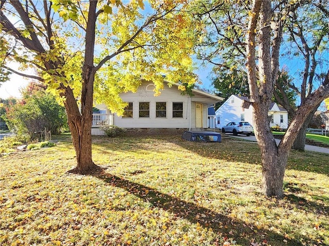 exterior space featuring crawl space and a lawn