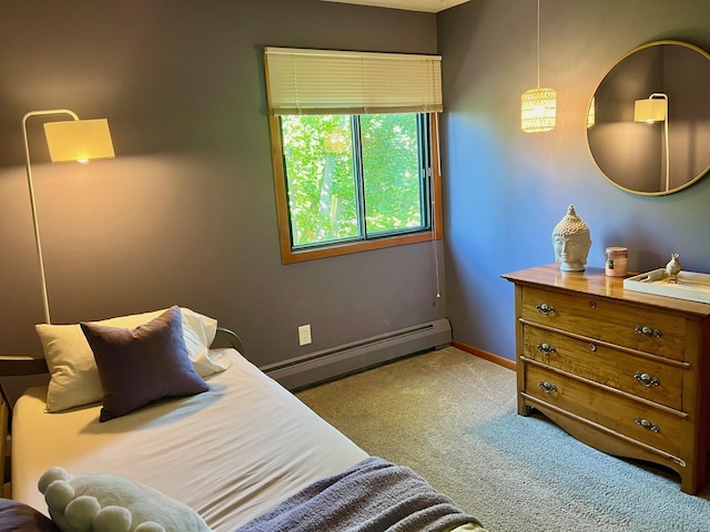 carpeted bedroom with baseboard heating