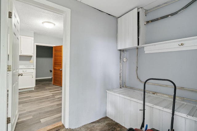 washroom with a textured ceiling