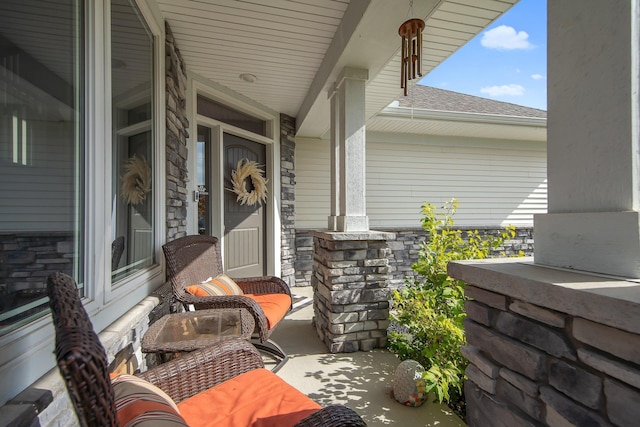 view of patio featuring a porch