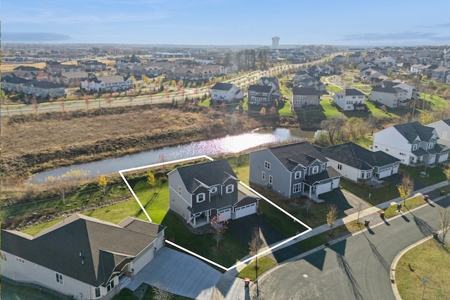 aerial view featuring a water view