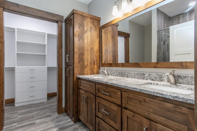 bathroom featuring vanity and wood-type flooring