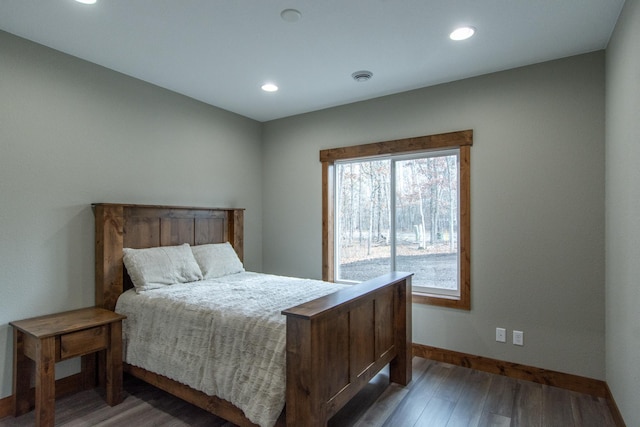 bedroom with wood-type flooring