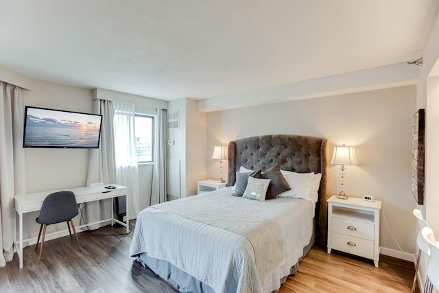 bedroom featuring light hardwood / wood-style floors