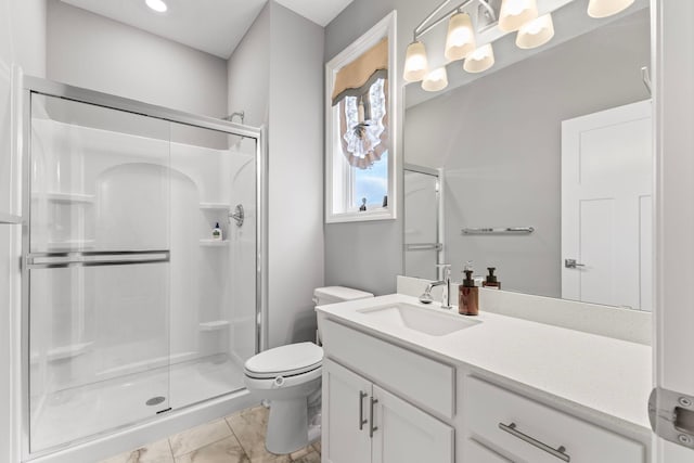 bathroom with toilet, an enclosed shower, and vanity