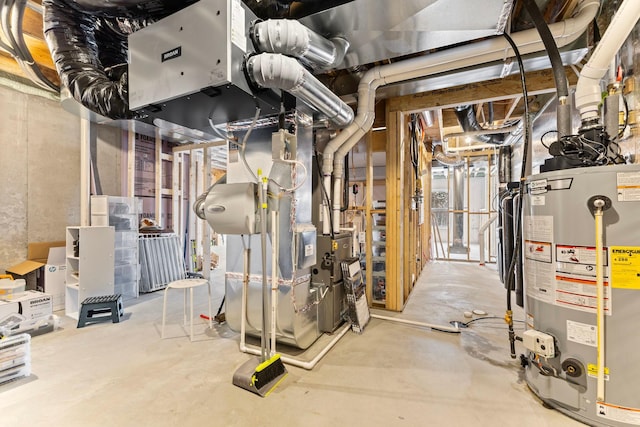 utility room with water heater and heating unit