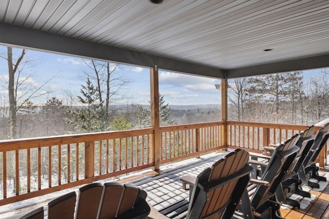 view of snow covered deck