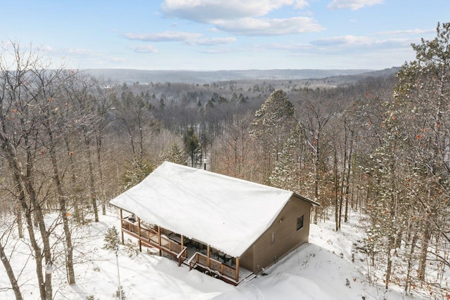 28255 Friendly Valley Rd, Washburn, WI 54891 - snowy aerial view with a wooded view