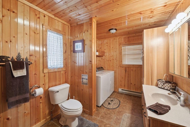 28255 Friendly Valley Rd, Washburn, WI 54891 - bathroom with a baseboard heating unit, vanity, washer and clothes dryer, toilet, and wood ceiling