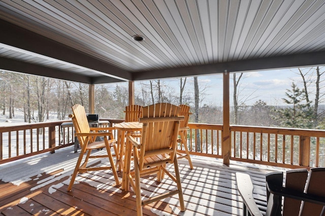 28255 Friendly Valley Rd, Washburn, WI 54891 - deck featuring outdoor dining area and view of wooded area