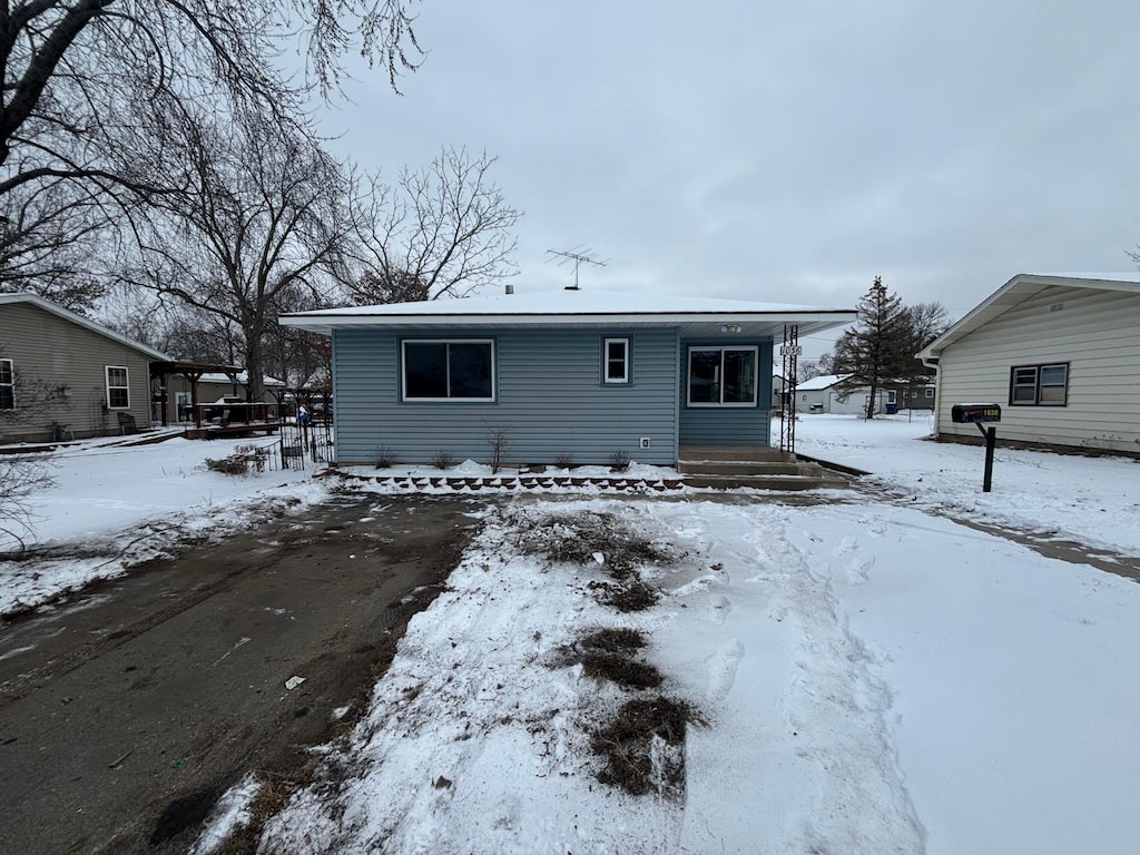 view of snow covered house