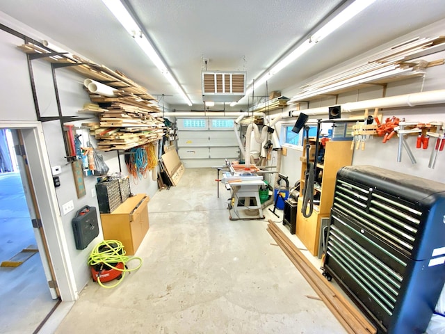 garage featuring a workshop area