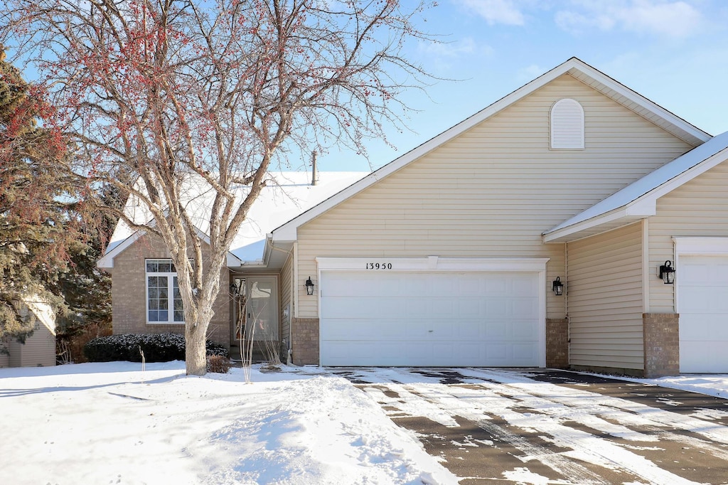 view of front of property with a garage