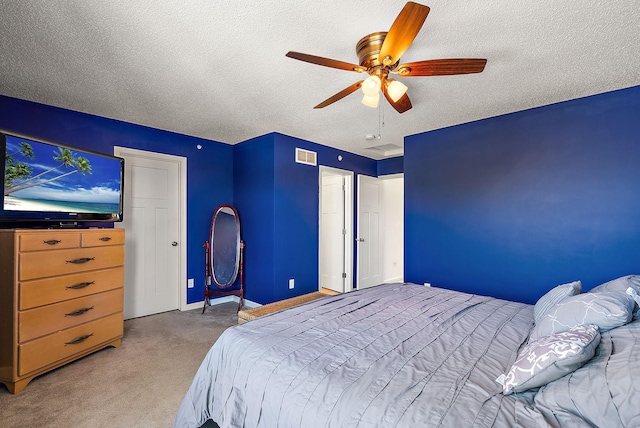 9668 Unity Ln N, Brooklyn Park, MN 55443 - carpeted bedroom featuring a textured ceiling, ceiling fan, and baseboards