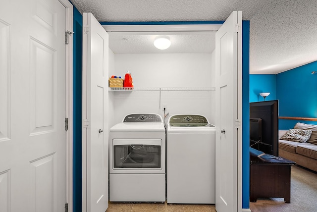9668 Unity Ln N, Brooklyn Park, MN 55443 - clothes washing area with washing machine and clothes dryer and a textured ceiling