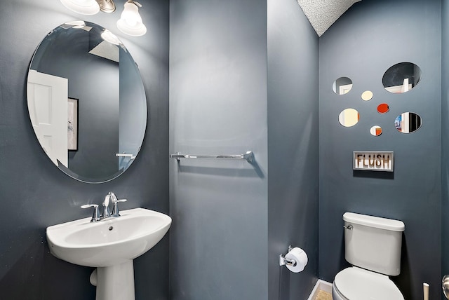 9668 Unity Ln N, Brooklyn Park, MN 55443 - half bathroom with toilet and a sink