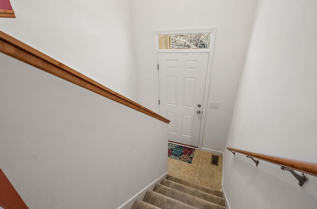 9668 Unity Ln N, Brooklyn Park, MN 55443 - staircase with baseboards