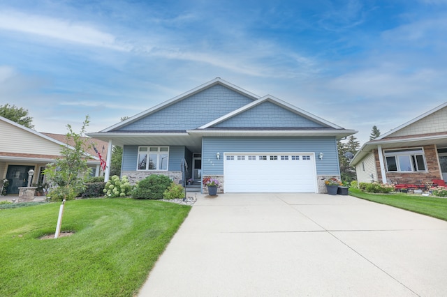 craftsman-style home with a front lawn and a garage